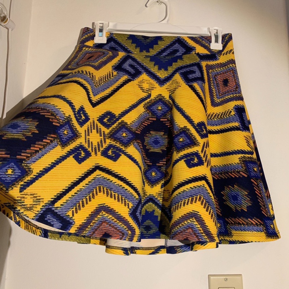 Funky yellow circle skirt with colorful patterns